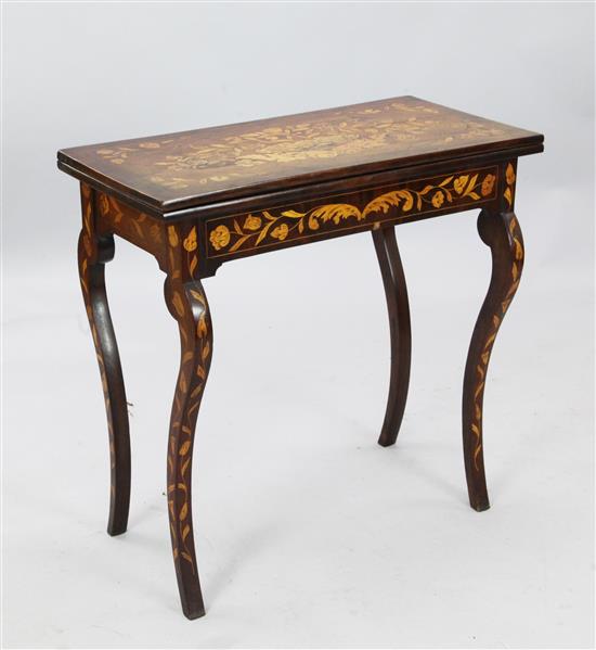 An early 19th century Dutch marquetry card table, W. 2ft 7in. D. 1ft 4in. H. 2ft 7in.